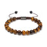 Elegantes Tigerauge Armband mit 8 mm Natursteinperlen auf weißem Hintergrund – Premium Schmuck von UNIQAL